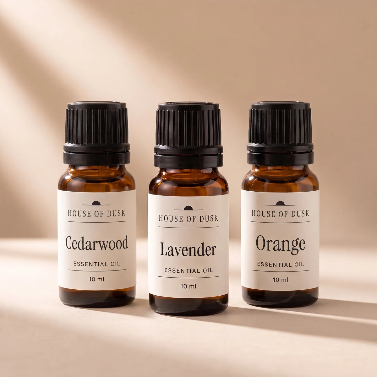 Cedarwood, Lavender and Orange essential oils in 10 ml amber glass bottles