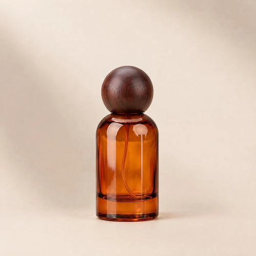 Amber glass spray bottle, 30 ml, with a dark walnut ball cap